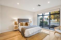  57 Glen Lossie Street Woodville South SA 5011 $700,000 to $770,000 Enjoying a fabulous position among the prestigious ‘Glens’ of Woodville South, this brand new two-storey home is superb from start to finish. It’s the little luxuries that make this Torrens Title build townhome when it comes to selection. A huge ground floor master bedroom suite is easily accessible from the extra wide entry, where its northerly aspect welcomes a constant soaking of natural light, and a large walk-in robe and Spotted Gum dual-vanity ensuite bathroom add extra comfort. Created for entertaining, the open plan kitchen, living and dining is well-lit, inviting and intricate. A stunning American Oak topped waterfall island adds warmth to the sleek white cabinetry and textured tile splash back that will have any home chef itching to get into this kitchen. Complete with Bosch stainless steel appliances including a 900mm gas cooktop, wall oven and dishwasher, butler’s pantry, breakfast bar and wealth of storage. The living space with feature gas wood log fire will be the place to be as winter approaches, while dual sets of sliding doors allow for easy access to a hardwood rear decked alfresco and side courtyard with lawn. Head up the Tasmanian Oak staircase and you’ll be pleasantly surprised by the size of a second living space or kids’ retreat, as well as a further three bedrooms including huge front double with built-in robes that would happily convert to a home office or third living space. Serviced by a large family bathroom with bath and shower, along with full-height storage to the passage that is sure to come in handy. Delight in the details: – Solid 19mm timber floors upstairs – Huge wraparound understair storage – Double length carport – Ducted reverse cycle air conditioning – Spacious laundry + third w/c to ground floor – Walk-in robes to bedrooms 3 & 4 Just over 10-minutes to the CBD, with commutes made easy via train and bus transport. Schools, shops, hotels, reserves and the sea – they’re all within easy reach here. Quality and total comfort, this one will be hard to resist. 
