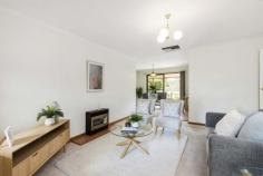  Unit 5/26 Panorama Drive Athelstone SA 5076 $360k-$380k The neat-as-a-pin home that was so kind to its loving owner for so long is ready to wrap its low-maintenance arms around a downsizing duo, retirees, savvy investors, singles or a couple with a kid in waiting where leafy Athelstone meets a cul-de-sac and a quiet community of just seven like-minded abodes. With the ease of a smaller unit but space of a larger home, this free-standing cutie offers the best of both worlds on a landscaped plot made for pottering around, a small pet, and Sunday lunches under a paved alfresco pavilion. Inside, two bedrooms and multiple living zones make for a comfy and courteous home with the added bonus of an updated kitchen boasting a gas cooktop, plenty of storage and a garden view. The kitchen flows freely to its adjacent casual meals zone and onto a family/lounge room with a very generous 25sqm (approx) of room to spread your wings and watch TV in the relative comfort of ducted cooling. A tub and shower ensure the main bathroom caters for bubs and big people between those two bedrooms, including a master with a bank of built-in robes and room for a king bed. Just a stroll from several reserves – and not much further from the Black Hill Conservation Park – it’s also a home with leisure in mind. Make it yours. And there’s more: – Lock-up garage with remote entry and internal access – Gas heater to lounge room – Second toilet and separate laundry – Breakfast bar and subway tile splashbacks to kitchen – Stylish timber-look floors to kitchen and casual meals zone – Secure gated rear entry – Custom window furnishings throughout – Just a short drive from post office, pharmacy, dental surgery and more – Close to St Ignatius’ College.. 