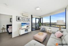  182/41 Chandler Street Belconnen ACT 2617 $445,000+ ***Although restrictions have lifted please remember COVID-19 guideline rules. It is requested that attendees sign in using Check in CBR app with the displayed QR code at this property. Social distancing is to be respected.*** This fantastic 2 bedroom apartment is situated on the 11th floor in the sought after Altitude complex! You'll be sitting pretty in this stylish apartment with so many amenities at your doorstep. The spacious & sunny open plan living area, well-designed kitchen with dishwasher, electric cooktop and ample bench space and neutral decor throughout will be sure to please. The sweeping views can be enjoyed from the living area and from your private balcony. Each of the bedrooms are spacious in size. The complex features an outdoor heated pool, a fully equipped gymnasium, and BBQ facilities overlooking Lake Ginninderra for truly resort-style living. Centrally located in the heart of Belconnen, with many popular cafes, restaurants, shops and scenic walking paths and recreational areas around Lake Ginninderra all nearby. Close to several Government departments, schools and the Canberra City Centre only a short drive away this apartment offers a fantastic urban lifestyle. Quality features include: 2 bedroom apartment Built in robe to main bedroom Built in cupboards to 2nd bedroom European style laundry with dryer Stylish kitchen with ample bench space and additional stainless steel dishwasher Covered entertaining balcony Gym, heated outdoor swimming pool and common areas Prime location.. 