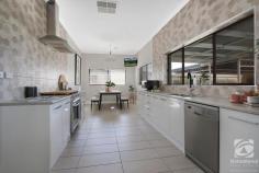  276 Beechworth Road Wodonga VIC 3690 Presenting as an incredibly rare opportunity for the astute purchaser, this beautifully renovated family home is full of potential and one you must inspect. Positioned on a seldom found 1244m2 block in the heart in bustling Wodonga, the possibilities are endless. The home comprises of three spacious bedrooms all including ceiling fans and two of which include built-in storage. The family bathroom, central to the three bedrooms, has been stylishly updated with floor to ceiling tiles and a deep bath with shower. Highlighting the original character and charm of the home, high ceilings with ornate cornices allow an abundance of natural light into the property. The large open plan living area positioned at the front of the home is the ideal setting for the family games night or a more intimate movie night. A naturally flowing floorplan, the kitchen and meals area, situated to the back of the property with great view of the huge backyard. Well appointed, the kitchen features an abundance of storage options and bench space and is complete with a new 900mm freestanding stove. Adjacent to the kitchen is the spacious meals area, the perfect setting for family breakfasts and dinners. The all-weather alfresco area is perfect for year around entertaining overlooking the picturesque rear yard which the kids and family pets are sure to enjoy. A double carport is accompanied with a double lock-up garage. An insulated coolroom off the garage is the perfect cellar, while the bar/rumpus area offers an ideal "Mancave". The home has been ideally positioned to the front of the block to maximise potential for development (STCA). Enjoying access from both Beechworth Rd and Cherry Tree Lane, this home presents as an ideal opportunity to keep the home and have an immediate income stream while you develop the back (STCA). Whether you are looking for the dream central home for you to live in and enjoy or a seldom found investment/development prospect, opportunities like these are as rare as hen's teeth! 