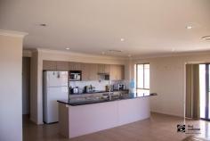  16 Bell St Denman NSW 2328 $430,000-00 Modern and spacious four-bedroom family home with large undercover outdoor entertainment areas •Attractive contemporary design rendered façade with street appeal •Overlooking farmland quiet and scenic location •All bedrooms with built in robes & ceiling fans •Master bedroom with walk in robe and ensuite •Elegant main bathroom and separate toilet •Separate lounge/theatre room •Spacious open plan tiled family / dining area •Well appointed kitchen with loads of cupboard space, walk in pantry, and S/Steel appliances •Ducted rev/cycle air/cond, solar hot water, down lights and ceilings fans through out •Great undercover outdoor entertainment areas # Tiled alfresco area, # wrap around undercover paved areas •Double garage with internal access electric doors and drive through access to back yard •Fully fence yard.. 