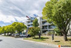  5/10 Burke Crescent Kingston ACT 2604 $450,000 ***Although restrictions have lifted please remember COVID-19 guideline rules. It is requested that attendees sign in using Check in CBR app with the displayed QR code at this property. Social distancing is to be respected.*** This fantastic loft style 1 bedroom apartment offers executive style living with a desirable design and in a location you won’t want to miss! The double height windows allow plenty of natural light throughout the apartment, giving a great sense of space. The well-equipped kitchen, which opens off the living area comes with ample bench space and a dishwasher. Ensuring your comfort with reverse cycle air conditioning, a washing machine, dryer and built-in robe to the loft style bedroom. To the front of the property, the private courtyard will help you relax, entertain or unwind with a leafy outlook. Perfect for first home buyers or an addition to your property portfolio. Home to excellent restaurants, popular bars and beautiful cafes, your neighbourhood hangouts would be some of Canberra’s finest. When you’re done eating, browse the chic boutiques in Kingston and Manuka, picnic or exercise at picturesque Lake Burley Griffin, shop at the Fyshwick Markets and enjoy Australia’s national treasures, all walking distance away. It only takes minutes to drive to the centre of the City and the Parliamentary triangle. Features of this apartment include: 1 bedroom apartment Loft design Open plan living Well equipped kitchen with fridge and dishwasher Reverse cycle air conditioning Built in robe to loft style bedroom Washing machine Dryer Courtyard Car space Fantastic investment opportunity! 