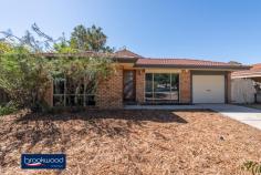  45 Inquirer Lane Stratton WA 6056 $329,000 What a find for first home buyers and downsizers. This 4-bedroom, 2-bathroom brick and tile home sits hidden on a winding lane and overlooking a grove of tall jacarandas. Set well back from the road with a fully fenced back yard offers extensive space for outdoor living, a lawn, and a small garden shed. • 	 4 bedrooms 2 bathrooms • 	 1995-built brick and tile • 	 Formal & informal living • 	 Good sized jnr bedrooms • 	 Open plan kitchen/family • 	 Carport with roller door • 	 Separate dining/activity • 	 Extensive outdoor living • 	 451 sqm fully fenced lot • 	 Hidden in a green glade Not only does this home deliver a flexible floor plan, good sized bedrooms and ample space for outdoor living, but the delightful setting also overlooks a stand of tall jacarandas with their seasonal display of purple exuberance and lush green canopy. An elevated position well back from the road adds to the sense of seclusion; it’s hard to believe schools, local shops, transport, and the Midlands CBD are mere minutes away. The front door opens into a formal lounge with reverse cycle air conditioning. This quiet, carpeted space is ideal for curling up with a book or enjoying uninterrupted screen time. Opposite the lounge is the good-sized main bedroom featuring built-in robes and an ensuite with shower, vanity and W.C. A central open plan kitchen/family room flows seamlessly to a south-facing verandah and decked gazebo to allow for effortless indoor-outdoor living. A U-shaped bench with an integrated breakfast bar and under bench storage delineates the well-designed kitchen. A cutaway wall creates a partial separation between the kitchen/family room and a formal dining room or activity space. This air-conditioned, multi-purpose room leads to the junior wing where three good sized bedrooms, two with robe recesses, share the family bathroom and a separate W.C. located off the walk-through laundry. A decked gazebo overlooks a small lawn and wide verandah in the fully fenced backyard, allowing ample space for entertaining or relaxing. A small garden shed sits in the far corner of the yard. The memorable setting, private backyard and sense of space create a delightful feeling that you have left the world behind. Yet, the convenient Stratton address puts shops, schools, public transport, and the Perth Hills’ outdoor adventures on your doorstep. To arrange an inspection of this property or for the best advice, the best service and the best solutions call Ken Wiggins on 0403 012 950. 