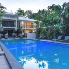 Thumbnail of 9/15 Andrews Close, Port Douglas, QLD 4877 T his beautiful residence located within Plantation House, is a timeless estate providing direct access onto Solander Park and Four Mile Beach. A much sought after location! Immaculately presented with quality fixtures and fittings, the villa offers stylish living with the feel of a family home. Its unique benefit is that it's the only villa in the estate to feature a large, private lawned garden. Generous proportions extend over two levels, two bedrooms and a bathroom are located on ground level. Upstairs are two further bedrooms and en-suite. The master bedroom being particularly spacious and enjoying views across the pool and park from its own balcony. Featuring stone bench-tops, quality appliances, and plenty of cupboard space the kitchen is central to the living and dining area. Leading out through floor to ceiling glass doors is a lovely alfresco space providing undercover outdoor dining and relaxing zones. A spectacular sparking pool can be accessed directly from here. To see more contact Ray White Smithfield . 