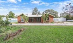  126-128 Bank St Howlong NSW 2643 Situated in the popular vibrant Howlong township. 1km to the town’s main street, easy access to all the towns amenities, the Mighty Murray River, and the Howlong Country Golf Resort.   Residence: A large family brick home with potential, the home comprises of four (4) bedrooms, the master complimented by a walk-in robe, two (2) living areas, kitchen featuring a large butler’s pantry and electric appliances, rumpus room, full family bathroom with separate toilet and a large well-appointed laundry.   Gardens and Surrounds: Set on a 1-acre (4,000m2 approx.) allotment, the property is well established while also offering the ability to add further inclusions, currently consisting of a huge outdoor entertaining/dining area, multiple gardens shed, chook pen, green house, a double garage plus large adjoining shed/workshop with bathroom facilities, side access via double gates, bore for sprinkler system and easy access to the ‘Black Swan Anabranch’   Agents Remarks: A property that appeals to a wide net of buyers with vast potential in a growing popular family friendly community, with easy access to major rural cities. 