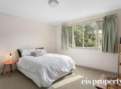  2/8A McRobies Road South Hobart TAS 7004 $545,000 Desirably located in ever-popular South Hobart in a quiet complex of just three townhouses, this light filled and spacious home has a well-designed and functional floorplan that maximises space and convenience whilst offering relaxed, low-maintenance living. The entry level is dedicated to living, encompassing a warm and inviting generously proportioned open plan space. Comprising the well-equipped kitchen with large pantry, dining and lounge area, this is a home where friends and family will always feel welcome. Sliders open onto the covered patio to create seamless indoor/outdoor living and a place to relax alfresco. The laundry and powder room complete the floorplan on this level. The staircase reveals two double bedrooms upstairs, one with walk in robe and the other with built in robe. Serviced by a central bathroom with bath tub, these are tucked away from the main hub of the home. An additional courtyard offers further space for pottering outside and a carport provides undercover off street parking. Within easy reach of the many shops, cafes and restaurants of South Hobart Village and nearby to good local schools and parks, the property is also close to public transport and is only minutes from Hobart’s CBD. This is an exceptional opportunity to enjoy an enviable lifestyle in a sought after suburb close to all amenities. 