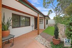  14 Warner Road Beechworth VIC 3747 $645,000 This unique and beautifully maintained home is the perfect blend of cosy mudbrick and rich native timbers. It is ready to move into without a thing to do. Upon entry you are greeted by a formal lounge room with a split system and a fourth bedroom, currently used as a home office to the right of the entrance way. The heart of this home includes a large open plan living room with adjoining kitchen and dining area. It makes an inviting place to entertain and accesses a covered veranda with sunset views. The living room features an efficient combustion wood heater with sliding door to the north facing patio area. The country style kitchen is a classic example of the builder's craftsmanship and has solid redgum bench tops and cabinetry. There is plenty of cupboard space including a walk-in pantry with an automatic light switch plus electric cooking and dishwasher. The peaceful rear sitting room with built in timber cabinetry makes an ideal space to curl up with your favourite book. Alternatively it would make another perfect home office space. The master carpeted bedroom, with ceiling fan and large walk in robe, has direct access to the covered veranda and is accompanied by a spacious ensuite with timber features and walk in shower. The two additional carpeted bedrooms are double-sized and queen-sized and offer convenient access to the main bathroom with shower, bath and timber vanity. There is a well-equipped laundry with external access. Outside it continues - beautifully maintained with rustic stone walls in place, established low maintenance gardens, deciduous trees and abundant local birdlife. The spacious garage accommodates two cars and is remotely accessed along with direct entry to the home. This property is a must see and will suit a range of buyers. 