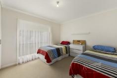  2 Brealey Place Naracoorte SA 5271 With a neutral decor, this immaculately presented town home, sits on a low maintenance block of 431m2, within a 10 minute walk to the town centre. Offering 3 queen size bedrooms, all with built-in robes. Central bathroom with a full length bath & shower, with the toilet separate. Open kitchen/dining, with spacious bench areas, a dishwasher, pantry, split system air-conditioning and electric appliances. The living area is off the wide entrance hallway. Single car garage under the main roof and the laundry offers outside access & good space. There is also a paved, undercover outdoor living area. Rainwater is plumbed to the toilet, kitchen sink & dishwasher. This home is spacious, inviting and rare to find. For the investor buyer the property is currently tenanted at $305/week until 09/11/21. 