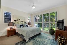  1/22 Wellington St Clayfield QLD 4011 Quiet, convenient and exclusive ground floor apartment. Welcome to 1/22 Wellington Street, Clayfield. This extremely sought-after ground floor residence consists of 3 bedrooms, 2 bathrooms, open plan kitchen, dining living with fabulous landscaped courtyard and outside dining retreat. A bonus is 2 secure undercover garage spaces close to your front door. This is the first time this home has come onto the market since the building was built in 2005. A rare opportunity to own within this prestige building which won’t last long! Located 7kms from the CBD, within a stones throw of quality public and private schools and is close to public transport. It is also only a short stroll to Oriel Place with a number of great retail and local restaurants as well as highly regarded cafes for the discerning coffee lovers. The well-manicured front gardens give great street appeal to the already impressive building. Don’t climb a single step on entry to this easy living , light-filled apartment. The layout has an effortless flow from the open plan kitchen, through the dining area and out to the undercover outdoor patio and garden. This private area with wrap around gardens was built for entertaining and is perfect for hosting family and friends. Carpeted floors, white louvers and ceiling fans are in the bedrooms. The light-filled master bedroom has a built-in robe and modern ensuite. The two other bedrooms are both king size and with built-in robes. The main bathroom has a modern vanity and well-designed laundry space. A decent storage cabinet is tucked away within the wall and in the hallway are built-in linen cupboards. If you are looking for low maintenance and privacy in a prestige complex, this is the home for you! Key features include: – Extremely private and in a great Clayfield location – Master Bedroom with built-in robe and ensuite – Open plan kitchen, dining living area – Air-conditioning – Undercover outdoor patio – Two secure car park spaces – Only five apartments in complex.. 