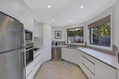  2/48 BROKEN BAY ROAD ETTALONG BEACH NSW 2257 Introducing this impeccable 3 bedroom townhouse, 4 years young and set in a friendly, quiet and 100% owner-occupied complex only 2 minutes’ walk to the water’s edge. Leave the everyday bustle behind and be welcomed by beautifully maintained gardens and a private, thoughtfully designed space offering an array of impressive features. Downstairs boasts relaxed open plan living and dining which flows effortlessly out to a paved patio with retractable shade cover, and a landscaped courtyard and garden. You’ll also find a large double bedroom with built-in robe and en suite complete with bathtub. Upstairs features an additional 2 double bedrooms, one with walk-in robe and mountain views, a two way bathroom and a convenient second living / study area. Further highlights include: - Plantation shutters, roller blinds and tinted windows throughout for privacy and a modern, coastal feel - Ducted reverse cycle air conditioning and ceiling fans for year round comfort - Hardwood timber stairs and LED lighting - Remote single garage with laundry and internal access - Plenty of storage upstairs and downstairs - 3rd toilet / powder room downstairs for guests - Pet-friendly complex - Strata $544 and rates $266 per quarter - A short, level walk to the waterfront, shops, cafes, restaurants and cinema - 5 minute drive to Umina surf beach and Woy Woy CBD and train station.. 