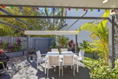  2/48 BROKEN BAY ROAD ETTALONG BEACH NSW 2257 Introducing this impeccable 3 bedroom townhouse, 4 years young and set in a friendly, quiet and 100% owner-occupied complex only 2 minutes’ walk to the water’s edge. Leave the everyday bustle behind and be welcomed by beautifully maintained gardens and a private, thoughtfully designed space offering an array of impressive features. Downstairs boasts relaxed open plan living and dining which flows effortlessly out to a paved patio with retractable shade cover, and a landscaped courtyard and garden. You’ll also find a large double bedroom with built-in robe and en suite complete with bathtub. Upstairs features an additional 2 double bedrooms, one with walk-in robe and mountain views, a two way bathroom and a convenient second living / study area. Further highlights include: - Plantation shutters, roller blinds and tinted windows throughout for privacy and a modern, coastal feel - Ducted reverse cycle air conditioning and ceiling fans for year round comfort - Hardwood timber stairs and LED lighting - Remote single garage with laundry and internal access - Plenty of storage upstairs and downstairs - 3rd toilet / powder room downstairs for guests - Pet-friendly complex - Strata $544 and rates $266 per quarter - A short, level walk to the waterfront, shops, cafes, restaurants and cinema - 5 minute drive to Umina surf beach and Woy Woy CBD and train station.. 