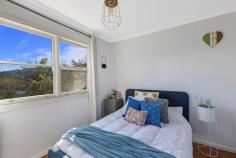  755 The Entrance Road Wamberal NSW 2260 From its funky coastal vibe to its idiosyncratic design, why live life to the norm when you can express your individuality here whilst sampling a lofted panoramic outlook for the ultimate in escapism. An harmonious atmosphere is evident from the moment you walk to the door, with a blend of chill out zones extending from inside to out. The entry deck provides a welcoming nook for that early morning coffee start outdoors, the lounge room that surprisingly becomes a soothing space where double glazed windows and doors help nullify any outside noise, the sun filled rear north east facing entertaining deck with a scenic outlook that implores alfresco living, and for that pinnacle place to retreat to then venture upstairs to the studio space with another lounge deck to unwind on whilst admiring the widespread ocean views. Add to this a retro inspired kitchen, a bathroom that is true testament to a bygone era, groovy spiral staircase and charming laminate timber floors throughout and it’s easy to see what sets this home apart. There’s also a six foot high fence at the front for extra privacy, lock up garage, plus additional car parking bay which also makes a handy turn around space to safely exit on to the street. Only a two minute walk to shops, bus stop close buy, or three minutes drive to Wamberal beach. If you dare to be different then don’t you dare miss this. OPEN FOR INSPECTIONS: Please be mindful parking at this property is very limited, best parking options are Reads Road or behind the shops on Ghersi Avenue. 