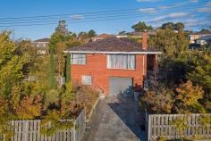  119 Box Hill Road Claremont TAS 7011  $459.000 Have you been looking for a solid brick and tile family home? Then look no further as this one is sure to tick all of the boxes. This great property has so much on offer and would make a fantastic family home or a low maintenance investment opportunity. Easy walking distance to local primary schools, Claremont college and just a few minutes drive to Claremont plaza shopping centre this one is ideally positioned. A low maintenance brick and tile property, offering three good size bedrooms, a large living area with the comfort of both wood heating and reverse cycle heatpump. The kitchen is neat offering ample beach space and a spacious dining area perfect for family get togethers. The garage under is huge, ideal for a man cave, or workshop and there is also secure OSP. The established gardens are stunning, a great place to relax and unwind a the end of the day, also featuring an abundant array of fruit trees, including apricot, apple, plum, peach, nectarine, lemon, pomegranate, quince, medlar, olive, grape and kiwi! This property is exceptional value and will certainly not last long. Call today for further information or to book your private inspection. 