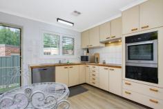  4/20 Dominion Circuit Forrest ACT 2603 $720,000 This affordable and stylish single-level townhouse is a short stroll to Manuka and Kingston Village precincts, both of which are well known for their culinary delights and stylish boutiques; whilst it is also only a short walk from Lake Burley Griffin and local park-lands. This unique home exudes cottage charm the moment you walk through the front gate, with its well-established and attractive gardens. The light filled, open-plan living and dining areas also create a sense of space and you will delight in the comfort and security offered by your home. The main bedroom provides ample cupboard space with direct access to the large two-way bathroom. Additional features include built-in robes in the second bedroom, lock-up garage, electric heating/cooling and additional courtyard/utility space in the rear of the property. This home offers a low-maintenance lifestyle choice with security and is located in peaceful surrounds, yet within easy access of the popular inner-south chic lifestyle precincts. It is ideal for the over 50s, situated in a boutique complex (being only one of five), with minimal outgoings. EER2 Features: • Convenience of walking distance to Manuka & Kingston • Secure single level living • Easy maintenance • Low outgoings • Electric cooking and dishwasher • Quiet location.. 