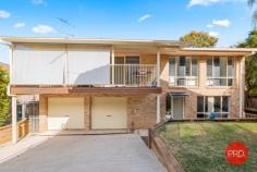  2/105 Combine Street Coffs Harbour NSW 2450 $599,000 - $649,000 Only minutes from the Coffs Harbour CBD this surprisingly large property is perfect for an investor or owner occupier. A self managed strata consisting of only 2 properties makes this a very unique opportunity. Currently set up as a 5 bedroom family home there is the possibility for dual living with a kitchenette, 2 bedrooms and a bathroom on the lower level which would easily make this self contained. Upstairs there are 3 good sized bedrooms, the main bathroom, neat kitchen plus separate living and dining areas. A verandah at the front of the property has privacy blinds and off the master bedroom is another verandah with a peaceful outlook towards Coffs CBD. Parking is by way of an oversized double garage with room for 2 cars and a small workshop area if required. To complete the package there is a level yard for the kids or pets to play and everything has been neatly landscaped. A very rare opportunity to purchase a low maintenance home in a fantastic location. If you've been looking for value in the current market then I urge you to inspect this home today! 