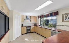  6 Angus Close Bovell WA 6280 With 2,003sqm of space where the greatest asset is that no one else can be there peering into your private space! Five bedrooms with two master suites, three bathrooms and four separate living/activity areas not including the free-standing games room. The house is over size in every respect with a total ground floor area of a massive 445sqm with the house alone being 319sqm. Multiple living areas provide the opportunity for the generations to escape each other whilst being able to congregate together in a beautiful open plan kitchen/living/dining area, and around a swimming pool which the house, games and alfresco area are literally wrapped around. The clever floor plan can cater for a self-contained bedsit off the entrance hall, PLUS a master suite/parent’s retreat wing PLUS the three minor bedrooms on the opposite side of the main living areas. Essentially, the house comprises: Front drive-thru carport much like a small hotel lobby with the front entrance adjacent. The double doors into the wide hallway lead to a drawing room on the left and a large bedroom suite plus en-suite with shower recess, vanity and WC to the right. This room could quite easily be used as a granny flat or teenager’s retreat. Further to the left lie three minor bedrooms, two with built-in wardrobes and the third with a walk- in wardrobe and views over the swimming pool to the rear of the house. Also overlooking the swimming pool is a games/activity room adjacent to the minor bedrooms with a reverse cycle air conditioner. The hallway houses a storage/linen cupboard with the family bathroom adjacent having a vanity and large shower recess with a tiled seat. The large laundry has a trough built into a cabinet plus a large bench on the opposite side of the laundry providing convenient additional workspace with a paved drying area just outside. The family WC is adjacent to the laundry off the hallway. There is a separate entrance off the hall to the double garage which has a further single roller door to the rear to push a trailer through to the rear yard if necessary. The open plan kitchen/living/dining area opens onto to 5m by 5.5m timber deck under the main roof overlooking the swimming pool which is a central feature to the living areas. The large kitchen has two large appliance cupboards, an oversize corner walk-in pantry, 900mm stainless steel Westinghouse gas hot plate, range hood plus a 600mm stainless steel oven and Dishlex dishwasher. There is a 1 ½ bowl sink and a wide fridge recess. The large lounge area, also serviced by its own split system reverse cycle air conditioner has a Saxon woodfire in addition and runs seamlessly onto the rear alfresco deck area, where there is also a lawned courtyard with fishpond and water feature. The parent’s retreat area has sliding doors leading to a foyer with further built-in cupboards and broom cupboard where a large media room adjacent also looks over the lawned courtyard. The large master suite has a large walk-in wardrobe and en-suite with a large corner spa, WC, vanity and large shower recess with tiled seat. With a free standing 8m by 8m games room with timber deck on the other side of the 3m by 6m solar heated pool, this house has few equals as far as living and entertaining areas are concerned. Other features include a 7m by 8m Colorbond shed, vegetable garden beds, solar hot water system, extensive landscaping and reticulation off a bore. The parkland opposite with a walkway through to Bovell Park and a playground further enhances the feeling of space and tranquillity. Contact your South West Sales Representative, Joe White on 0417 939 715 to arrange a private inspection or to receive more information on this property. 