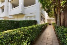  1/22 Wellington St Clayfield QLD 4011 Quiet, convenient and exclusive ground floor apartment. Welcome to 1/22 Wellington Street, Clayfield. This extremely sought-after ground floor residence consists of 3 bedrooms, 2 bathrooms, open plan kitchen, dining living with fabulous landscaped courtyard and outside dining retreat. A bonus is 2 secure undercover garage spaces close to your front door. This is the first time this home has come onto the market since the building was built in 2005. A rare opportunity to own within this prestige building which won’t last long! Located 7kms from the CBD, within a stones throw of quality public and private schools and is close to public transport. It is also only a short stroll to Oriel Place with a number of great retail and local restaurants as well as highly regarded cafes for the discerning coffee lovers. The well-manicured front gardens give great street appeal to the already impressive building. Don’t climb a single step on entry to this easy living , light-filled apartment. The layout has an effortless flow from the open plan kitchen, through the dining area and out to the undercover outdoor patio and garden. This private area with wrap around gardens was built for entertaining and is perfect for hosting family and friends. Carpeted floors, white louvers and ceiling fans are in the bedrooms. The light-filled master bedroom has a built-in robe and modern ensuite. The two other bedrooms are both king size and with built-in robes. The main bathroom has a modern vanity and well-designed laundry space. A decent storage cabinet is tucked away within the wall and in the hallway are built-in linen cupboards. If you are looking for low maintenance and privacy in a prestige complex, this is the home for you! Key features include: – Extremely private and in a great Clayfield location – Master Bedroom with built-in robe and ensuite – Open plan kitchen, dining living area – Air-conditioning – Undercover outdoor patio – Two secure car park spaces – Only five apartments in complex.. 