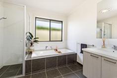  12 Wade Street Hamilton VIC 3300 $489,000 Modern Brick home less than 4 years old close to Schools, shops, parks & CBD Excellent floor plan boasting central gas heating and two living rooms All dour bedrooms have built in robes with master having walk in and ensuite Open plan kitchen/Dining/Lounge with huge split system air conditioning Kitchen has huge 5 burner gas cooker, dishwasher and walk in pantry Lounge room with sliding door to outside east facing under cover entertainment area Family bathroom is super modern with separate bath, shower and vanity Separate laundry with ample cupboards & benches with outside access Double lock up garage with remote access is attached to the house with internal access Outside there is child/pet friendly secure colour bond fencing and garden shed Low maintenance garden with water tank and all the trimmings for family life This house will sell very quickly as the market is screaming for these houses. Act now!!! 