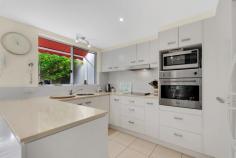  1/22 Wellington St Clayfield QLD 4011 Quiet, convenient and exclusive ground floor apartment. Welcome to 1/22 Wellington Street, Clayfield. This extremely sought-after ground floor residence consists of 3 bedrooms, 2 bathrooms, open plan kitchen, dining living with fabulous landscaped courtyard and outside dining retreat. A bonus is 2 secure undercover garage spaces close to your front door. This is the first time this home has come onto the market since the building was built in 2005. A rare opportunity to own within this prestige building which won’t last long! Located 7kms from the CBD, within a stones throw of quality public and private schools and is close to public transport. It is also only a short stroll to Oriel Place with a number of great retail and local restaurants as well as highly regarded cafes for the discerning coffee lovers. The well-manicured front gardens give great street appeal to the already impressive building. Don’t climb a single step on entry to this easy living , light-filled apartment. The layout has an effortless flow from the open plan kitchen, through the dining area and out to the undercover outdoor patio and garden. This private area with wrap around gardens was built for entertaining and is perfect for hosting family and friends. Carpeted floors, white louvers and ceiling fans are in the bedrooms. The light-filled master bedroom has a built-in robe and modern ensuite. The two other bedrooms are both king size and with built-in robes. The main bathroom has a modern vanity and well-designed laundry space. A decent storage cabinet is tucked away within the wall and in the hallway are built-in linen cupboards. If you are looking for low maintenance and privacy in a prestige complex, this is the home for you! Key features include: – Extremely private and in a great Clayfield location – Master Bedroom with built-in robe and ensuite – Open plan kitchen, dining living area – Air-conditioning – Undercover outdoor patio – Two secure car park spaces – Only five apartments in complex.. 