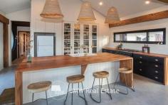  36 Hazelbrook Rise YALLINGUP WA 6282 $1,795,000 This four bedroom home is unique in so many ways and has also been carefully and thoughtfully designed to accommodate comfortable family living. The 1.565ha (3.8 acre) lot is the pick of the location being at the end of the cul-de-sac with panoramic views over rolling hills, valleys, a tree lined creek, vineyards and out to the Leeuwin Naturaliste Ridge. Features include: * 160k litre water tank * Extensive use of Bunbury jetty timbers and recycled brick pavers * Concrete floors with low VOC sealer * Marri benchtops and day bed sourced from trees on the block * Extensive storage throughout * 900mm Smeg oven and stove * Smeg dishwasher * Double glazing * No VOC paints internally * Wall panels are an eco product with no VOC’s * Rustic playground made from jetty timbers * 2000 native trees and shrubs planted * 20 mixed olive trees planted * Hear the ocean on still winter nights * Ocean glimpses around the block * Highly efficient Yunca Xander fire with 10 hour burn time * Fenced veggie beds * Huge pantry * Concrete render and pressed tin on the bathroom walls * All minor bedrooms are large * Four undercover patio areas (somewhere to go in any wind) * Petrol fire fight pump installed with long hose * Solar hot water * Large carport with built-in shed and bike shed * Peaceful and quiet yet close proximity to Yallingup * Close to beautiful Smiths beach * Registered as a holiday home (Shire requires new owners to re-register) can pass on the $2k bushfire management and evacuation plan As soon as you enter the residences you become aware of the feeling of the architecture blending into the natural landscape and environment. The very well appointed kitchen seamlessly meets with the dining area and then to the spacious light filled living room. The built-in slow combustion wood heater ensures you have the warmth and comfort to enjoy the winter months when the countryside pastures turn to a brilliant green. The master bedroom is well placed at the rear of the home and features a well designed en-suite, outside shower and bath with magnificent and varied views of the surrounding countryside. The three minor bedrooms are all generous in size and also have beautiful vistas served by a large bathroom with separate bath and shower. Parking includes a double carport with extra gravel paved areas for guest parking, trailers or boats and a workshop attached to the rear of the carport. The outside areas allow for entertaining through different seasons and weather conditions creatively landscaped with brick paving, lawns and vegetable gardens. The property and residence would suit family living and also be an ideal holiday home to retreat to from the pressures and stress of a busy city life. 