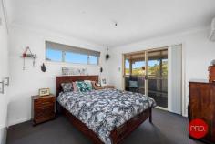  2/105 Combine Street Coffs Harbour NSW 2450 $599,000 - $649,000 Only minutes from the Coffs Harbour CBD this surprisingly large property is perfect for an investor or owner occupier. A self managed strata consisting of only 2 properties makes this a very unique opportunity. Currently set up as a 5 bedroom family home there is the possibility for dual living with a kitchenette, 2 bedrooms and a bathroom on the lower level which would easily make this self contained. Upstairs there are 3 good sized bedrooms, the main bathroom, neat kitchen plus separate living and dining areas. A verandah at the front of the property has privacy blinds and off the master bedroom is another verandah with a peaceful outlook towards Coffs CBD. Parking is by way of an oversized double garage with room for 2 cars and a small workshop area if required. To complete the package there is a level yard for the kids or pets to play and everything has been neatly landscaped. A very rare opportunity to purchase a low maintenance home in a fantastic location. If you've been looking for value in the current market then I urge you to inspect this home today! 