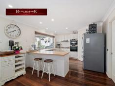  18 Pleasure Point Road Pleasure Point NSW 2172 Situated in a unique location this refreshingly spacious five-bedroom single level home offers peace and privacy away from the business of the outside world. Built 20 years old and presenting "as new" with an expansive and functional floor plan, this magnificent home offers sizable living areas that flow outwardly from the kitchen, dining and family areas. - Five large bedrooms; with built in robes. The main includes a large ensuite with walk in robe. - Timber flooring throughout the home - Neat kitchen, new gas cook top with stainless steel appliances - Large dining area comfortably accommodates a 12-seater dining table - Ducted air conditioning - Expansive outdoor alfresco area - Laundry fitted with cabinetry - Electronic security shutters on all windows - Low maintenance infinity edge inground sparking mineral pool - Fabulous block of land 929m2 block - Huge Attic upstairs for storage - New 13.2 kw solar system - Off street parking for additional vehicles/boat/trailer or caravan - Fully fenced with side access and rear access - Natural bush outlook - Close to Holsworthy Railway & M5/M7 access Located within minutes' drive to the Holsworthy Train Station, also it's only a short drive to Wattle Grove shopping village, schools, parks, and the M5 & M7 motorways. Contact Benchmark National today on 9822 4333 for your private inspection! 