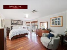  18 Pleasure Point Road Pleasure Point NSW 2172 Situated in a unique location this refreshingly spacious five-bedroom single level home offers peace and privacy away from the business of the outside world. Built 20 years old and presenting "as new" with an expansive and functional floor plan, this magnificent home offers sizable living areas that flow outwardly from the kitchen, dining and family areas. - Five large bedrooms; with built in robes. The main includes a large ensuite with walk in robe. - Timber flooring throughout the home - Neat kitchen, new gas cook top with stainless steel appliances - Large dining area comfortably accommodates a 12-seater dining table - Ducted air conditioning - Expansive outdoor alfresco area - Laundry fitted with cabinetry - Electronic security shutters on all windows - Low maintenance infinity edge inground sparking mineral pool - Fabulous block of land 929m2 block - Huge Attic upstairs for storage - New 13.2 kw solar system - Off street parking for additional vehicles/boat/trailer or caravan - Fully fenced with side access and rear access - Natural bush outlook - Close to Holsworthy Railway & M5/M7 access Located within minutes' drive to the Holsworthy Train Station, also it's only a short drive to Wattle Grove shopping village, schools, parks, and the M5 & M7 motorways. Contact Benchmark National today on 9822 4333 for your private inspection! 