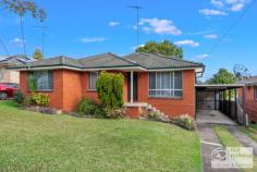  23 Gideon Street Winston Hills NSW 2153 Genuinely spacious throughout this conveniently located single level home set on a 588sqm block offers the first home buyer an ideal beginning to home ownership. Well maintained, the interior wins your approval from the first step inside with a lovely formal lounge, separate dining, neat and tidy updated kitchen with a pantry and ample bench-space adjoined by the everyday family/meals area. Also boasting the convenience of a 2nd separate toilet, the comfort of split system reverse cycle air conditioning, ceiling fans, beautiful polished timber floors to the living areas, carpet to the large bedrooms (2 have built-ins) a tandem carport with drive through access to the large rear fully fenced secure yard, perfect for the kids and pets. There's also under house storage, an NBN connection, GAS in the street and the handy position is only 600m to the T-way buses, less than 1km from local shops and schools and provides easy access to the M2, M7, M4, Parramatta CBD and the Westmead Hospitals. A great space to call 'home' ... BE FIRST TO SEE! 