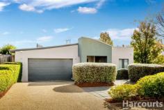  32 Eric Mawson Street Harrison ACT 2914 Located in the sought-after pocket of Harrison you will find this modern family home that offers the perfect blend of indoor and outdoor entertaining, with proximity to schools, parks, and the picturesque 'Wells' Station walking track combine to deliver a stunning family home with the ultimate lifestyle appeal. Positioned on a comfortable 622m2 (approx.) block, this brick veneer home offers attractive street appeal. Welcomed in by a fresh, modern palette the home shines during the day with its vaulted ceilings and north-facing living areas that allow for stunning natural light. With a huge list of inclusions, this lovingly maintained family home will be high on your list of open for inspections this week. At a glance: - North facing formal lounge, master bedroom, and living room with vaulted ceilings providing endless natural light. - Blockout curtains and blinds - Ducted and zoned Brivis dual fuel (refrigerated air conditioning and gas heating) from the same vents and single control panel - Instantaneous gas hot water with digital temperature control in both bathrooms - Spa bath to the main bathroom - Kitchen with 40mm Caesarstone benchtops including 3m waterfall island, Smeg cooking appliances, and ultra-quiet Bosch dishwasher - Formal lounge with acoustitherm insulation and 5 x in-ceiling booming surround sound speakers for your home theatre pleasure - Paved outdoor entertainment area with wired outdoor speakers, a 6m x 3.5m remote controlled retractable awning, 2 x natural gas points for BBQs and/or heaters, and a built-in slide for the kids - Landscaped garden with natural bluestone retaining walls (over $100k worth!), and Established flowering garden plus olive and apple trees, and herb garden. - Hedges and 9 bay leave trees to provide year-round greenery and privacy to the courtyard and BBQ area - Security system with perimeter (doors and windows) reed switches plus internal motion sensors - RING wifi video doorbell and security video floodlight camera - 'Crimsafe' security screens to external doors and keyed window locks to all windows - 2.4 kW solar panel system on $0.45 feed-in tariff - LED lighting throughout the home - CAT6 network cabling to formal lounge, living room, and bedrooms 2 and 3 - NBN fibre to the premise (FTTP) - Extra-wide oversized garage with built-in storage - 10kg front load washer and 6 kg dryer.. 