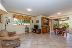  3/2 Walker Street Mount Helena WA 6082 $375,000 Write your next chapter in a modern, light-filled, 2-bedroom, 1-bathroom, plus study home set in a delightful over 55s community. A strata development of only five freestanding homes, landscaped gardens and a stunning natural setting create a lovely Hills hideaway with style. A central open-plan design, surprisingly spacious backyard and an easy walk to the Mount Helena village deliver convenience and the freedom to craft the life you want. • 	 2 beds 1 bath plus study • 	 1997-built brick and iron • 	 Spacious light-filled home • 	 Main bed w semi-ensuite • 	 OP family/kitchen/meals • 	 Separate study/craft rm • 	 Private paved verandah • 	 Spacious low-main garden • 	 Carport under main roof • 	 Walk to village centre Make a move to a comfortable, easy-care home at the heart of the charming Hills’ village of Mount Helena. Within walking distance of local shops, medical facilities, vet, pub and park, the bright, spacious home sits in a small, well-maintained over 55s community. A  verandah, edged with landscaped gardens leads to the front door and into a tiled entryway with a bedroom arranged at either side. The good-sized main bedroom is filled with natural light and features built-in robes, an overhead fan, R/C/ A/C and semi-ensuite access. The junior bedroom offers a welcoming space for guests with garden views and a built-in robe. The home’s heart is an open plan kitchen/meals/family room with reverse cycle air-conditioning. Double doors expand the central living area into a separate study/studio – flexible space, ideal for creative activities, quiet reading or screen time. The well spacious kitchen features an L-shaped bench with an electric cooktop and oven, under bench cabinets and a walk-in pantry. Tucked behind the kitchen are a large linen press and walk-through laundry. A wide sliding door links the open-plan area to a delightful and private backyard with a paved verandah wrapping the north-east corner of the home, a manually reticulated garden planted with flowering natives, and a small garden shed. A separate, powered storage room could be used as a small workshop, to store tools and tinker. A gate in the rear fence leads to a communal area planted with fruit trees. Don’t miss your chance to downsize without compromise, discover the joys of Hills’ living and the charm of Mount Helena. 