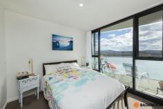  250/1 Anthony Rolfe Ave Gungahlin ACT 2912 $365,000 ***Although restrictions have lifted please remember COVID-19 guideline rules. It is requested that attendees sign in using Check in CBR app with the displayed QR code at this property. Social distancing is to be respected.*** **Entrance via Gribble Street, Tower B, Level 6** This modern 1 bedroom plus study apartment in the highly sought after location of Gungahlin is sure to tick all the boxes. Situated on the 6th floor this apartment offers privacy, comfort and convenience all in one, with a luxury heated infinity swimming pool & spa bath, fully equipped gym with shower amenities and enclosed alfresco/function room with kitchen and bathroom facilities and Gungahlin Market Place just at your door step. The north facing floor plan showcases a fantastic outlook toward Yerrabi with an abundance of natural light pouring through the open plan living and dining area. The modern kitchen boasts quality stainless steel appliances and stone benchtops. In addition the two way bathroom adjoins to the walk through robe leading to the bedroom, the extra storage and separate laundry is sure to please. Easy living starts here, with all you need and more. Take advantage of the accessible transportation and leave the car at home, with The Light Rail and Gungahlin Bus Interchange just a short stroll away. Living amongst the action means having everything at your fingertips, with a local Woolworths, Aldi, Kmart, Spotlight, Bunnings and an array of restaurants and cafes. Quality features: 1 bedroom plus study apartment Open plan living and dining area 6th Floor Loads of natural light Walk through robe Two way bathroom European style laundry Additional storage Car space with storage Heated infinity swimming pool & spa bath Fully equipped gym with shower amenities 