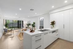  6 Brook Avenue Plympton SA 5038 $595,000 to $655,000 This street frontage 2018 built Torrens titled architecturally designed Townhome offers quality construction together with high end specifications & finishes to create the best of modern low maintenance living. Light natural colour tones feature in the designer kitchen with stone bench, onto a large open plan living & dining space filled with northern light through big glass sliding doors opening onto a covered alfresco. Also on the ground floor is an optional master bedroom with wall to wall robe with drawers and shelving and a spacious luxurious ensuite. Laundry with overhead cupboards and space for washing machine and separate dryer and a separate wc. A generous lock up garage has secure direct internal access. Upstairs there is another master bedroom option with huge wall to wall robe with easy access to the main bathroom with a full size bath plus a third spacious bedroom with built in robes, plus there is a study nook with built in bench. Some of the other features and specifications include; • High 2.7m ceilings and tall 2.4m doors • LED Lighting throughout, heat lamps to bathrooms, data points to study and under stair, extra double power points throughout with TV aerial to both sides of living space and a TV point to master bedroom • Sensor lighting to front for security • High quality kitchen with several soft close drawers and doors, pot drawers and powered appliance space, microwave space and plumbed fridge space, spot lighting under overhead cupboards • Bosch Stainless steel Appliances with large 700mm gas cook top and Bosch dishwasher • Large easy access pantry • 40mm stone bench tops with waterfall ends • Good size vanities for more storage with stone bench tops • Large alfresco with mains gas connection point for BBQ or Heater • Large floor to ceiling robes to bedrooms with all having soft close drawers and shelving • Double linen cupboard & under stair storage space • Garage with sealed non slip 2pack floor • Ducted reverse cycle A/C • Security system • Colour video Intercom • Auto timer controlled irrigation to established green gardens Situated in a quiet location with a park at the end of the street & 10 minutes drive to the City or the beach. If you’re unfamiliar with the localities, restless legs will find it an easy stroll from quiet Brook Avenue to the newly developed Weigall Oval Reserve & walking trails, Rex Jones Reserve or – for any four-legged friends – the West Torrens Dog Park. 