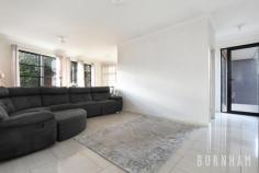  3/32 Burns Street Maidstone VIC 3012 $790,000 - $840,000 This three-bedroom townhouse epitomises spacious and bright living; wrapped up in one of the most desirable streets in Maidstone. Space poses no issue in the dining and lounge area of the home, where large floor to ceiling windows that face out upon the large backyard allow for light to fill the room. A study nook accompanies this space. Enjoy cooking with ease in the stylish and sleek kitchen, with stone benchtops, a double sink, an abundance of cabinets, tiled splashback, chrome accents, European gas appliances and an island bench. A central powder room and separate laundry with backyard access completes this lower level. Newly carpeted stairs guide you to the upper level of the home. The enormous master suite has a prodigious walk-in robe that fulfils all your storage needs and a generous ensuite complete with an oversized shower and vast vanity space. The second and third bedrooms are large, and light filled and are both serviced by double built-in robes. The upper level is completed by a central bathroom with a tub, extended vanity space and ample storage. Located less than 10kms from Melbourne’s city, a range of amenities are made readily available to you. Indulge yourself at the many surrounding cafes and restaurants, unleash the shopaholic within at Highpoint Shopping Centre, travel from the nearby bus/tram stops or immerse yourself in nature at the Maribyrnong River and multiple parklands/reserves close by. Additional features: – Separate laundry with backyard access – Security camera and intercom – Double garage with internal access – Split system heating and cooling in lounge area, master bedroom and upper level – Generous and low-maintenance backyard.. 