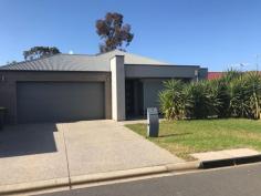  8 Harry Court Munno Para West SA 5115 This 2012 ultra-modern designed home situated in a quiet court is perfect for those who are looking to enter into the housing market or add to your investment portfolio Comprising of three spacious bedrooms, the master situated towards the front of the home and is finished with a spacious walk-in robe and ensuite. The remaining bedrooms benefit from built-in robes. Main bathroom fitted with quality fixtures and fittings, complete with separate toilet. The modern kitchen overlooks the meals/lounge areas, providing seamless interaction with your guests as you entertain. All the modern conveniences are catered for with stainless steel appliances, dishwasher, Caesar stone bench-top, corner pantry and an abundance of bench and cupboard space. Additional features include: Ducted reverse cycle air conditioning, 500 x 500 porcelain floor tiles throughout main areas, 9 ft ceilings throughout, alarm system, and low maintenance gardens This is a great opportunity for someone looking for a quality, spacious property in a great street with real value for money. 