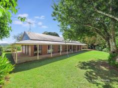  209 Maleny Stanley River Road Maleny QLD 4552 Don't miss this FANTASTIC BUY on 1.5 acres(6102m2) just outside Maleny! * Over 1.5 acres of parklike grounds with stunning rural views to the North West * Impeccably maintained single level home with extra high ceilings, Western Red Cedar doors and windows, lovely as is or add your own touches with kitchen and bathroom upgrades * Spacious formal and family areas, huge kitchen with walk in pantry, wrap around verandahs * 3 generous bedrooms, study/4th bed and 2 bathrooms, main with parents retreat * Original Maleny dairy bails converted to double carport and workshop next to the home * Established gardens and feature trees for supreme privacy, numerous fruit and nut trees with irrigation * 44,000L water tank, solar hot water + 1.5Kw PV back to grid * Your own cosmetic upgrades will only add value to this high quality home Lovingly maintained by the same family for the last 29 years, an inspection is a must to appreciate the ambience at this property. It will SELL QUICKLY so don't miss your chance to secure a great home only 2kms to Maleny with capital growth potential! 
