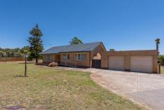  1391 Great Northern Highway Upper Swan WA 6069 $419,000 At the heart of the much-loved Swan Valley food and wine region, this 1.62-acre property with a 3 bedroom, 1 bathroom brick and tile home offers excellent access to the surrounding attractions, a large, mostly level lot and a workshop with 3-phase power. • 	 3 bedroom, 1 bathroom • 	 1963-built brick and tile • 	 Dec cornice 9-ft ceilings • 	 Main bed built-in robes • 	 OP kitchen dining lounge • 	 W’shop 3-phase power • 	 Covered alfresco entert. • 	 Great arterial road links • 	 Level 1.62-acre property • 	 3-min Upper Swan P.S. Room to move, a powered workshop and secure garage and drive-through access to the back yard give this 3 bedroom, 1 bathroom home plenty of potential. Sitting along the Swan Valley food and wine trail, the property puts you in the middle of the delights of this much-loved Perth attraction. The 1963-built brick and tile home sits towards the front of the 1.62-acre lot freeing up the expansive backyard to utilize or reimagine as you wish. At the front of the property, an entry hall leads to the open plan lounge/dining room. A sliding door opens to the covered patio at the rear of the home. Ornate cornices and 9-ft high ceilings feature throughout the property. The kitchen is fitted with original 1960s wooden cabinetry, a free-standing oven and small pantry. A wall of built-in robes provides ample storage in the main bedroom. Both of the carpeted junior bedrooms are a good size. A built-in sleep out at the rear of the homes offers a third bedroom or spacious activity/playroom. The family bathroom features a large shower recess and an original 60s vanity in excellent condition. A walk-through laundry with separate W.C. leads to the paved patio at the rear of the home. This property waits for you to make of it what you will: embrace the potential of an address on the popular food and wine trail, take advantage of the powered workshop and 1.62-acre lot with drive-through access or simply enjoy the solid, comfortable home within easy reach of Upper Swan Primary School, local equestrian centre and Ellen Brooke Nature Reserve. 