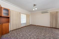  1391 Great Northern Highway Upper Swan WA 6069 $419,000 At the heart of the much-loved Swan Valley food and wine region, this 1.62-acre property with a 3 bedroom, 1 bathroom brick and tile home offers excellent access to the surrounding attractions, a large, mostly level lot and a workshop with 3-phase power. • 	 3 bedroom, 1 bathroom • 	 1963-built brick and tile • 	 Dec cornice 9-ft ceilings • 	 Main bed built-in robes • 	 OP kitchen dining lounge • 	 W’shop 3-phase power • 	 Covered alfresco entert. • 	 Great arterial road links • 	 Level 1.62-acre property • 	 3-min Upper Swan P.S. Room to move, a powered workshop and secure garage and drive-through access to the back yard give this 3 bedroom, 1 bathroom home plenty of potential. Sitting along the Swan Valley food and wine trail, the property puts you in the middle of the delights of this much-loved Perth attraction. The 1963-built brick and tile home sits towards the front of the 1.62-acre lot freeing up the expansive backyard to utilize or reimagine as you wish. At the front of the property, an entry hall leads to the open plan lounge/dining room. A sliding door opens to the covered patio at the rear of the home. Ornate cornices and 9-ft high ceilings feature throughout the property. The kitchen is fitted with original 1960s wooden cabinetry, a free-standing oven and small pantry. A wall of built-in robes provides ample storage in the main bedroom. Both of the carpeted junior bedrooms are a good size. A built-in sleep out at the rear of the homes offers a third bedroom or spacious activity/playroom. The family bathroom features a large shower recess and an original 60s vanity in excellent condition. A walk-through laundry with separate W.C. leads to the paved patio at the rear of the home. This property waits for you to make of it what you will: embrace the potential of an address on the popular food and wine trail, take advantage of the powered workshop and 1.62-acre lot with drive-through access or simply enjoy the solid, comfortable home within easy reach of Upper Swan Primary School, local equestrian centre and Ellen Brooke Nature Reserve. 