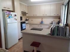  21 John St Blackbutt QLD 4306 $289,000 Located 1 block to the primary school & short walking distance to the shops, is this 3 bedroom home with built-ins & set on 1077sqm. The features are reverse cycle air con. in the lounge room, new cook top & oven, security screens on the doors & windows, single lock up garage with carport, large front verandah with rear deck to relax on to have your morning coffee. Town & tank water, green house & garden shed. Just Listed. 