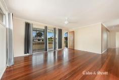  3 Cuthbert Street Albany Creek QLD 4035 Boasting a floor plan ideal for many demographics this solid brick and tile home will cater for growing families, and business couples working from home. Investors can secure strong rental returns and there are many future options here to add value and continue appreciating into the future. On entry upstairs there is a covered verandah leading to a spacious living area and updated well planned kitchen all on polished timber floors. Three spacious built in bedrooms are serviced by a modern bathroom with separate bath, shower and W.C. Internal stairs lead down to a large rumpus and home office (7.4mx2.3m) with its own convenient and secure front entry access. Large double garage, 2nd bathroom facilities and laundry further compliment the home. Further quality improvements and features include: - Reverse cycle air conditioning in living area and bedroom ceiling fans; - Modern appliances including dishwasher and ample storage space in the kitchen; - Recently painted gyprock interior; - Tiled roof restoration, repainted and repointed; - Fully fenced to the side & rear on a 607sqm block with wide 18.5m frontage. 