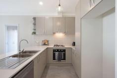  82A Celtic Avenue Clovelly Park SA 5042 Matt Giblin from Ray White Daw Park is proud to bring to the market 2 brilliant homes with "Turn Key" finishes, located in one of Adelaide's most exciting up and coming locations. Enjoy the peace of mind and luxury that comes with buying a new home, complete with all new appliances. The homes have great floor plans resulting in 3 spacious bedrooms, dual living areas and family friendly back yards. The second living areas at the front are flexible spaces to suit your lifetyle. All 3 bedrooms come with large mirrored built in robes. The ensuites and bathrooms are finished to a high standard. The kitchens have new dishwashers, ovens and gas stove tops. Soft close drawers, stone bench tops, ample storage cupboards, breakfast bars and feature splash backs make for attractive and functional kitchens. The open planned family and dining spaces integrate beautifully with the covered pergolas and lawn in the back yards. Other features to love: - Parking Space for 2 cars - Automatic garage door - Internal access to home from the garage and access to back yard through rear garage door. - 2.7 Height internal Ceilings - Stainless steel appliances - Large format tile flooring - Carpet in bedrooms - LED Lighting - Reverse cycle air conditioning - Ducted and Zoned heating and cooling - Separate laundry with storage and outside access - Landscaped - Paving - Water tanks with grey water pump Location highlights Clovelly Park and the inner south offers unparalleled access to facilities such as Westfield Marion, Flinders Hospital and Flinders University. Recently completed Aldi Supermarket and the new Tonsley Innovation District is nearby. The new Tonsley Train Line is a real game changer when it comes to transport options but there's already many bus routes servicing the area. Access to schooling, shops, doctors, Southern Expressway and beaches is fantastic. Approx 10Km to city. 