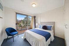  5/43-51 Giles St Kingston ACT 2604 Just minutes to the excitement of Kingston and surrounds while privately tucked away from the noise and bustle of this thriving precinct is this light filled top floor two bedroom apartment. Providing a relaxing and tranquil lifestyle, still in the heart of the social action and only minutes' walk to Kingston foreshore. Offering a spacious and practical flowing floor plan with a full brick construction, your new home features two large bedrooms (master with walk in robe) and large open plan lounge and dining areas. The kitchen is equipped with a walk in pantry and bathed in nature light. The bright northerly balcony flowing off the living area is perfect for entertaining guests and the second rear balcony off the bedrooms provides scope to enjoy an alfresco breakfast on a lazy Sunday morning. Spend your weekends strolling around Lake Burley Griffin or join friends for a drink at the hottest bars and restaurants that Kingston and Manuka have to offer. Just a few paces from the Kingston Sunday markets, you can enjoy the low maintenance living giving you more time to spend on those leisurely activities or alternatively what a fabulous easy set and forget investment. Inspect today, you won't be disappointed! Features: Two bedroom top floor apartment Walk -in robe to master bedroom, and Built in robes to second bedroom Open plan lounge and dining Well equipped kitchen with walk in pantry Two large sized balconies Bathroom with separate bath and shower Good size storage room Secure parking with remote access.. 