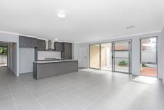  19A Albemarle Way High Wycombe WA 6057 $400's Stunning bright and fresh, and only 2-years young! you will not find better, this is a very rare find! This modern rear family home has everything you could ever desire, with the added bonus of the security and peace you get from being set back from the road. The four large bedrooms, all with built-in robes, the master with en-suite, featuring both his and her vanities, frameless glass shower with twin shower heads, separate w/c, and tasteful tiling that will not date. The open plan family, dining, and kitchen is huge and absolutely bathed in natural sunlight, boasting 600×600 porcelain tiles throughout, once again in a very neutral colour, which is beautifully complemented by the very modern kitchen which is finished in a light/mid grey timber look finish, stone top Island bench, 900cm stainless steel oven and gas cooktop and plenty of bench and cupboard space. The large glass sliding door opens out to the very private rear undercover alfresco area, perfect for all-year-round entertaining and lazy Sunday afternoon Bar-B-Qs with family and friends. Here you will also find the well-designed low-maintenance garden beds, perfect if you enjoy growing your own Herbs and Veggies! Other features include, access through the double garage directly into the home and to the rear garden, ducted and zoned reverse cycle airconditioning, quality blinds throughout, separate W/C, both bath and shower in the second bathroom. No need to wait 2 years and go through the heartache of building, this property is as close as you will get to new, and it will be ready to move into at the end of September, so if you have an appreciation of style and quality, this might well be the home you have been waiting for! 