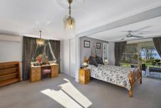  141 Lakedge Avenue Berkeley Vale NSW 2261 Serenity and space come together in this unique residence that not only offers an idyllic location, but also the versatility to accommodate a home business opportunity. Discretely tucked away from the street, adjoining waterfront reserve with views across the lake, vast window space maximises the outlook ensuring almost every room never feels enclosed. The property is ideal for those seeking space to spread both inside and out, with close to a ¼ acre of land and a flexible floor plan over two levels to cater for extended family needs or home office which was previously DA approved for a Hair Salon. Huge master bedroom with parents retreat and balcony access so you can feel like royalty in your own presidential size suite, alfresco dining areas on both upper and lower levels enhanced by stunning sunrise and sunset moments so no opportunity is missed. Meeting your entertaining needs is an awesome galley style kitchen with juliette balcony, inground pool and an impressive yard space that offers lush lawn, a variety of fruit trees, and a large concreted parking space for multiple cars, boat, jet skis and caravan. Enjoy comfortable and cost efficient living with 4 x air conditioners, ceiling fans, water tanks, 18 solar panels, and a freshly painted and carpeted interior. It’s expansively different, practically perfect and a unique offering that you must not miss. 