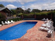  1075 Waratah Rd Waratah North VIC 3959 $2.75M Looking for an escape to a new way of life, just a bike ride from the pristine coastline, in the heart of picturesque Prom Country? Prom Coast Holiday Lodge offers the opportunity to purchase your own resort style complex complete with a substantial family home and sensational income stream. Set on approx. 10 park like acres with views over the surrounding farmland to the coastline and the majesty of Wilsons Prom National Park in the distance. Ranch style residence with open plan living areas, country kitchen and 4 bedrooms. Plus 5 self contained guest cottages set amidst the manicured gardens, and a group lodge that sleeps 20 with a huge open plan living room and central kitchen - ideal for weddings, parties, anything! Solar heated swimming pool, playground, trampoline, volleyball net and basketball court. 4 bay shed plus carport, chook pen and aviary, dam and fenced paddocks for a few stock or horses. Superbly maintained both inside and out with potential to expand (STCA), this property has been developed and built by the current owners who are ready to proudly hand over the reins with everything included, to continue with ongoing bookings. Inspections strictly by appointment. For further images and information, visit www.promcoastholidaylodge.com.au. 