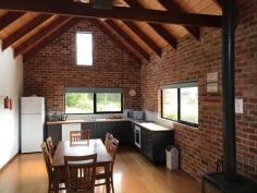  1075 Waratah Rd Waratah North VIC 3959 $2.75M Looking for an escape to a new way of life, just a bike ride from the pristine coastline, in the heart of picturesque Prom Country? Prom Coast Holiday Lodge offers the opportunity to purchase your own resort style complex complete with a substantial family home and sensational income stream. Set on approx. 10 park like acres with views over the surrounding farmland to the coastline and the majesty of Wilsons Prom National Park in the distance. Ranch style residence with open plan living areas, country kitchen and 4 bedrooms. Plus 5 self contained guest cottages set amidst the manicured gardens, and a group lodge that sleeps 20 with a huge open plan living room and central kitchen - ideal for weddings, parties, anything! Solar heated swimming pool, playground, trampoline, volleyball net and basketball court. 4 bay shed plus carport, chook pen and aviary, dam and fenced paddocks for a few stock or horses. Superbly maintained both inside and out with potential to expand (STCA), this property has been developed and built by the current owners who are ready to proudly hand over the reins with everything included, to continue with ongoing bookings. Inspections strictly by appointment. For further images and information, visit www.promcoastholidaylodge.com.au. 