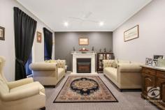  22 Gratton Way Beechworth VIC 3747 $890,000- $910,000 Boldly positioned, this lovely family home is truly something special. Fastidious, with attention to detail and impeccable presentation, this property is impressive both inside and outside. Bright and spacious, this quality-built home makes entertaining a dream, enjoying plenty of room to move with three living areas and a large alfresco zone. The impressive open plan kitchen, meals and family room, is complete with a self-styled quasi butler's pantry, central island bench, electric cooking, dishwasher and oodles of storage. High ceilings throughout add to the appeal, as does the wide formal entry. An elegant formal lounge room is situated at the front of the home and features an electric log fire with decorative mantle. Opposite here is the large private study with two walls of built-in bookshelves The carpeted master bedroom with ceiling fan, features a walk-in robe and large ensuite, with double walk-in shower and double vanity. The master has it own balcony capturing Beechworth's magical sunsets. Three carpeted bedrooms, all with built in robes and ceiling fans have easy access to the central bathroom with deep bath and separate shower. A well-equipped laundry has a full bench, with plenty storage and external access. A refrigerated heating and cooling system has been fitted, along with the recent installation of a 6.6kW solar system to slice through energy bills. Entertaining is an absolute pleasure and extends to an enclosed rear alfresco dining terrace with built in woodfire, taking in views of Mayday Hills gardens. Outside there is the added bonus of a covered barbeque area with woodfire overlooking the heated pool and garden. The front garden contains – what must be – the softest lawn you will ever see – or feel! A secure 6m x 8m ColorBond shed will house your vehicles and there is plenty of space on-site for a full-size caravan, boat or trailer. This property poses an exceptional, yet low-maintenance lifestyle, and deserves your inspection to be truly appreciated. 