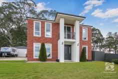  22 Gratton Way Beechworth VIC 3747 $890,000- $910,000 Boldly positioned, this lovely family home is truly something special. Fastidious, with attention to detail and impeccable presentation, this property is impressive both inside and outside. Bright and spacious, this quality-built home makes entertaining a dream, enjoying plenty of room to move with three living areas and a large alfresco zone. The impressive open plan kitchen, meals and family room, is complete with a self-styled quasi butler's pantry, central island bench, electric cooking, dishwasher and oodles of storage. High ceilings throughout add to the appeal, as does the wide formal entry. An elegant formal lounge room is situated at the front of the home and features an electric log fire with decorative mantle. Opposite here is the large private study with two walls of built-in bookshelves The carpeted master bedroom with ceiling fan, features a walk-in robe and large ensuite, with double walk-in shower and double vanity. The master has it own balcony capturing Beechworth's magical sunsets. Three carpeted bedrooms, all with built in robes and ceiling fans have easy access to the central bathroom with deep bath and separate shower. A well-equipped laundry has a full bench, with plenty storage and external access. A refrigerated heating and cooling system has been fitted, along with the recent installation of a 6.6kW solar system to slice through energy bills. Entertaining is an absolute pleasure and extends to an enclosed rear alfresco dining terrace with built in woodfire, taking in views of Mayday Hills gardens. Outside there is the added bonus of a covered barbeque area with woodfire overlooking the heated pool and garden. The front garden contains – what must be – the softest lawn you will ever see – or feel! A secure 6m x 8m ColorBond shed will house your vehicles and there is plenty of space on-site for a full-size caravan, boat or trailer. This property poses an exceptional, yet low-maintenance lifestyle, and deserves your inspection to be truly appreciated. 