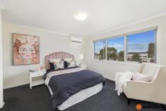  41/1 Arthur Blakeley Way Coombs ACT 2611 This spacious 4 bedroom multi-storey townhouse is located in the super convenient suburb of Coombs and provides both lifestyle and location, offering quality finishes and inclusions throughout. The home offers a light filled large open plan living area with the elegance of floating timber floors and a sleek, oversized kitchen with stainless steel AEG appliances including a dishwasher, gas cooktop and loads of bench space. Boasting spacious bedrooms, all with built in robes, you will have both space and comfort throughout this home. Complete with split system heating and cooling in the living areas and master bedroom. The convenient floor plan features a separate bathroom with bathtub and powder room to the upper level of the home, with ground level offering a separate laundry and additional powder room ideal for you family and visitors alike. Enjoy the outdoors with two separate spaces: a front courtyard and large outdoor covered patio area, perfect for entertaining all year round. For added convenience the generous oversized double garage includes loads of storage space and internal access, with storage and car parking both well catered for. Situated in a fantastic location of the peaceful Molonglo Valley district of Canberra, within close proximity to Charles Weston School, Molonglo Foreshore Park, Stromlo Forest Park and just a short drive to Cooleman Court Shopping Centre and Denman Prospect local shops with an array of cafes and restaurants. Features of the property include: Multi-storey home Large open plan living area 4 bedrooms Master bedroom with ensuite and views towards the Arboretum Reverse cycle air conditioning to living & master bedroom Study nook Modern sleek kitchen with high-quality AEG appliances and stone bench top Floating timber floors to the living area Oversized double garage with internal access, separate toilet and ample storage Two outdoor areas - large balcony with views of Mount Stromlo and fenced front courtyard.. 