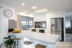  3 St Georges Court Victoria Point QLD 4165 $559,000 Sitting at the top of the cul-de-sac in an elevated position, this light filled family home offers two separate living areas, with lounge at the front and fabulous renovated kitchen with family room at the rear. All three bedrooms are large and have built-in wardrobes with the main bedroom having a walk through robe to two-way bathroom. Outside are two separate undercover entertainment area, great for having friends and family over, and there is huge side access to bring your boat/caravan onto your block. Located very close to the Victoria Point High School and St Rita’s Primary School, and 3 minute drive to shopping centres, restaurants, cinema, doctors, waterfront, parks. Currently tenanted until November 2021. Situated in South East Queensland, Victoria Point is a lovely Bayside suburb enjoying a sub-tropical climate most of the year, with a good sense of community values and everything at your door including, fantastic Bay walks with beaches at low tide. There are several schools, Doctors, shopping complexes, restaurants and cinema. Ferries run regularly from Victoria Point to Coochiemudlo Island where you will find golden sand and unspoilt beaches, soaring sea eagles above with turtles and dolphins in the bay. Close by there are private & public hospitals. Yet, just 35-40 minutes by road from Brisbane City, the International Airport and the Port of Brisbane. There is also a good transport infrastructure to the Gold Coast and Sunshine Coast, a train station within 15 mins plus the islands of Moreton Bay are easily accessed via ferries. 