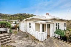  12 Baintree Avenue Dynnyrne TAS 7005  $575,000 Located in the popular suburb of Dynyrnne, just moments to the University of Tasmania, Sandy Bay shopping strip and breath taking Mount Nelson. A fantastic opportunity for those looking to invest or a purchaser their first home, with easy access to the CBD or Kingston. • 	 4-5 bedrooms / 2 bathrooms / 612m2 allotment previously let at $930 per week • 	 Excellent value, in very close proximity to Hobart's CBD, Sandy Bay and UTAS • 	 Home has offered a great rental return of over a number of years • 	 Updated kitchen and bathrooms • 	 A fresh paint and new floor coverings would have this home looking immaculate • 	 Huge potential to add value to the existing home • 	 Massive rumpus area and bathroom under, with scope to add dual occupancy Contact David or Simon for further details or to arrange your inspection. 